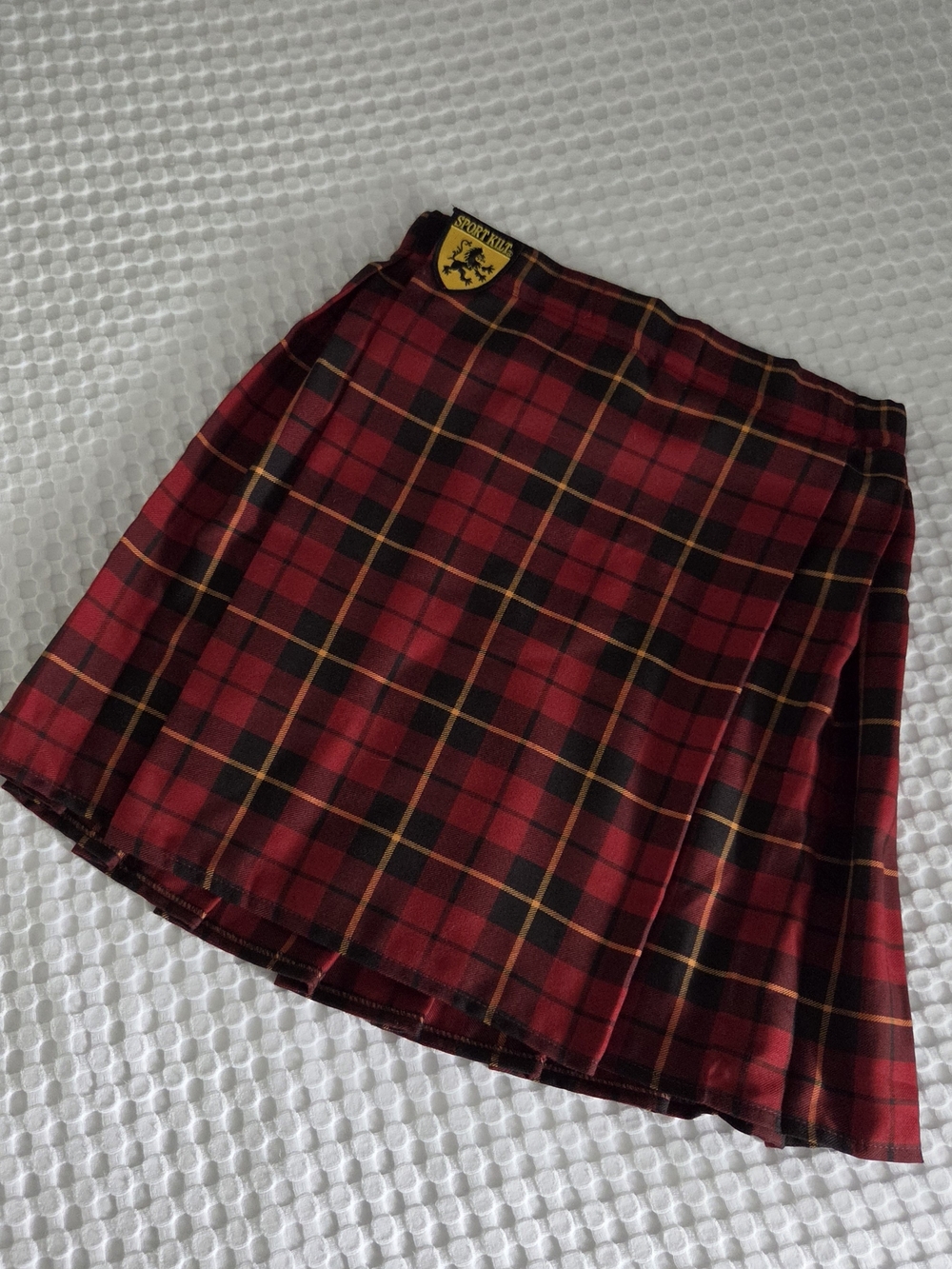 Red Plaid Pleated Mini Skirt with Crest Detail